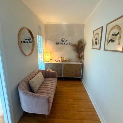 Welcoming entryway at Skin Ritualist facial spa in Fort Lauderdale, featuring elegant decor, branded signage, and a relaxing ambiance designed for personalized skincare clients.
